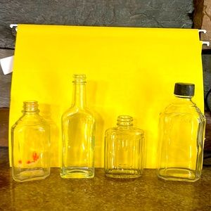 Set of 4 vintage antique apothecary embossed bottles art deco